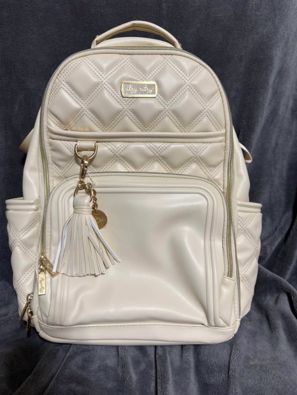 Itzy Ritzy Boss Plush Large Diaper Bag Backpack with Tassel Charm